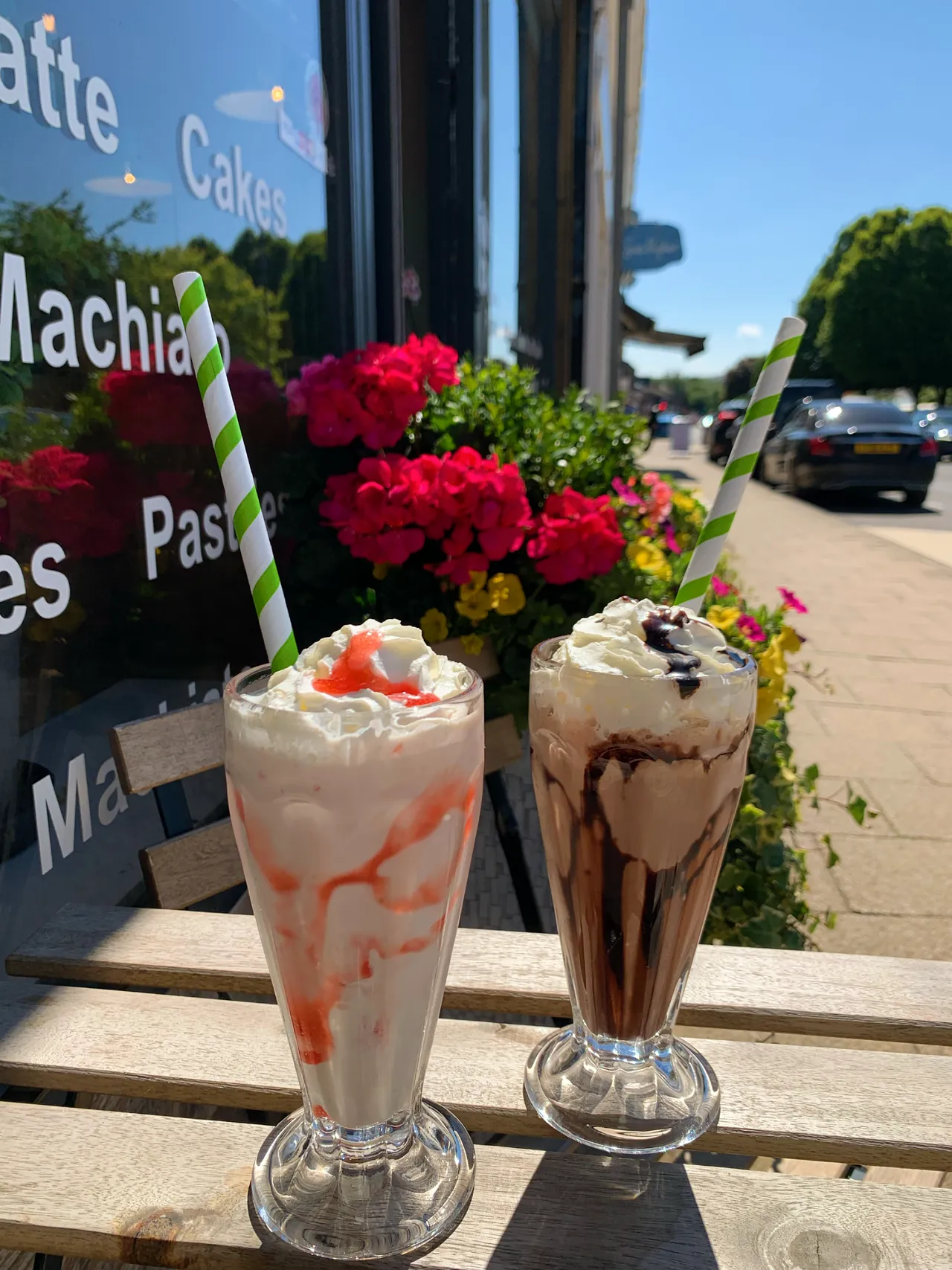 Two cold drinks outside the Corner House shopfront